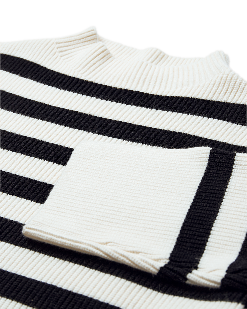 CMCOLIN – GERIPPTER PULLOVER IN WOLLWEISS UND SCHWARZ