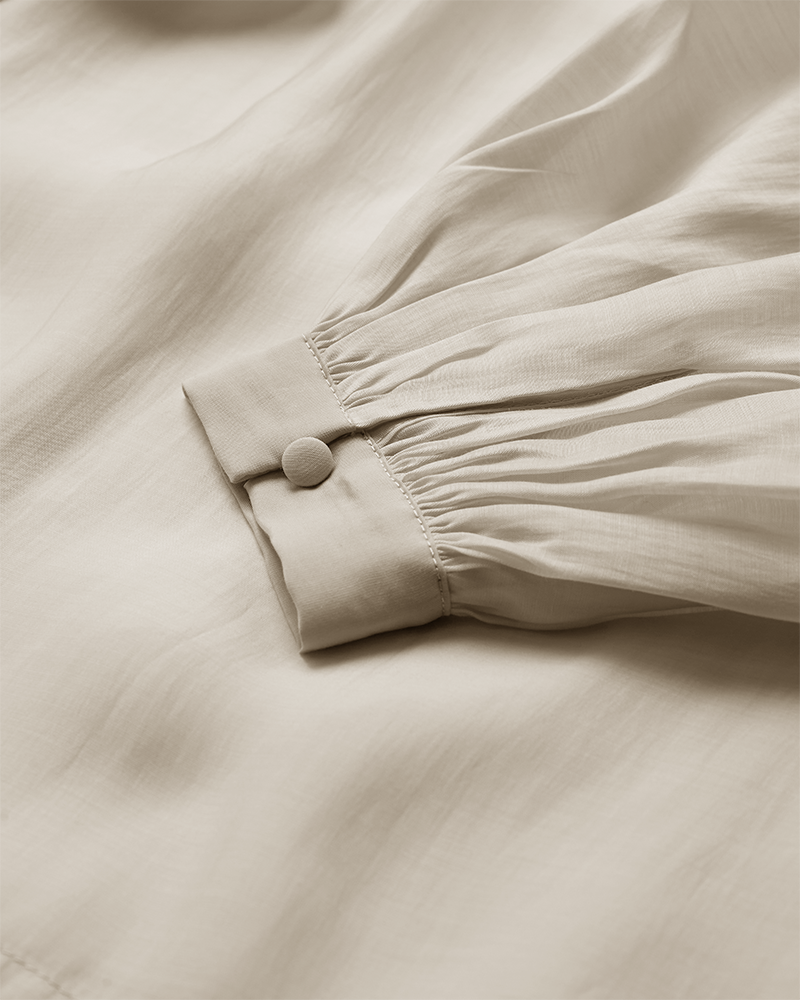 CMTILLY – BLUSE MIT SCHLEIFENDETAIL IN BEIGE
