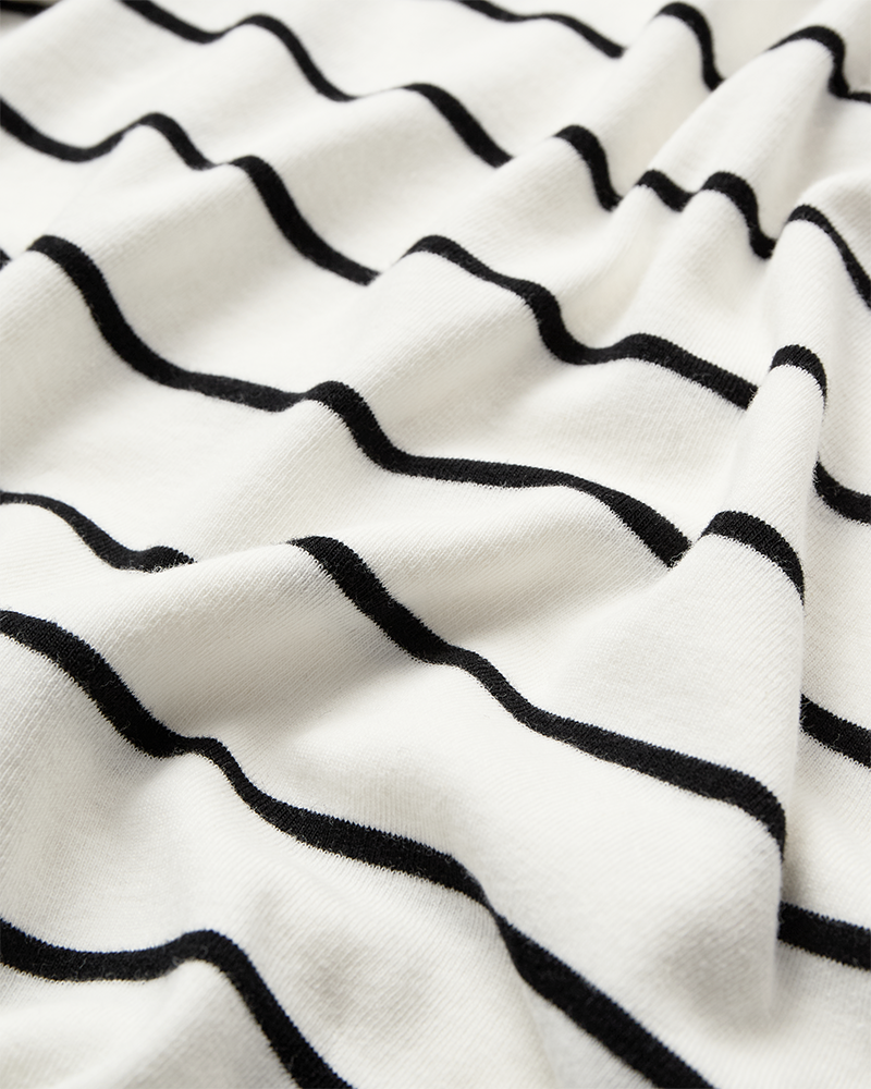 CMMUSE – POLOSHIRT MIT STREIFEN IN WOLLWEISS UND SCHWARZ